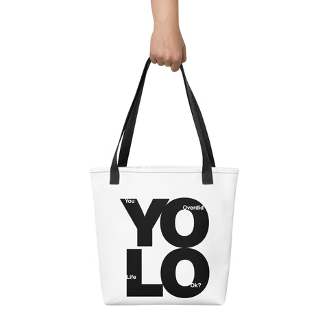 White tote bag with 'YOLO Tote Bag' design — Statement tote bags for those who overdid life and still look good.