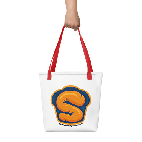 White tote bag with 'Softness Is My Superpower Tote Bag' design — Mental health accessory that carries weight.