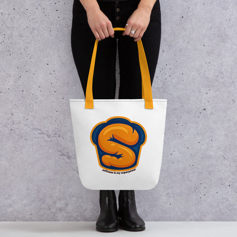 White tote bag with 'Softness Is My Superpower Tote Bag' design — Mental health accessory that carries weight.