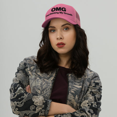 Pink retro trucker hat with 'OMG Retro Hat (Black Thread)' design — Funny mental health merch that doubles as a Thinking Cap—mesh in the back, spiral in the front.