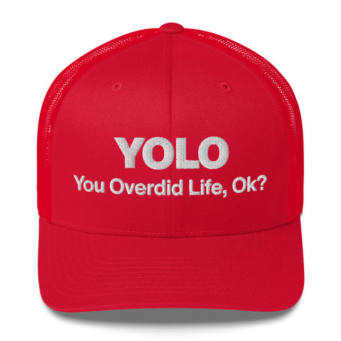 Red retro trucker hat with 'YOLO Retro Hat (White Thread)' design — Emotional support fashion with shade and ventilation.