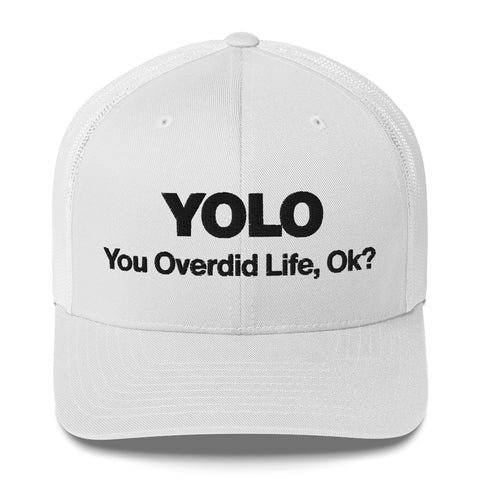 White retro trucker hat with 'YOLO Retro Hat (Black Thread)' design — Emotional support fashion with shade and ventilation.