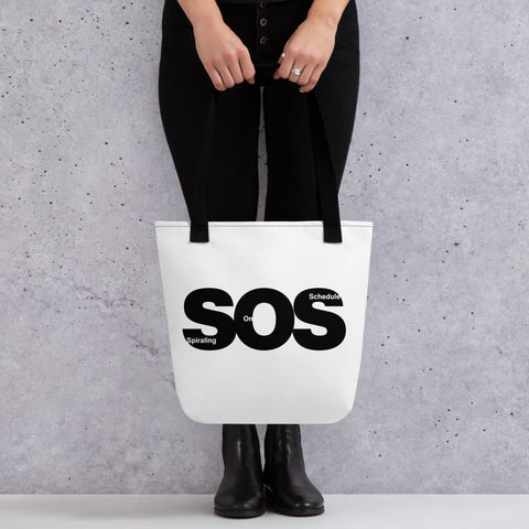 White tote bag with 'SOS Tote Bag' design — Emotional support bag for snack hoarders and spiral schedulers.