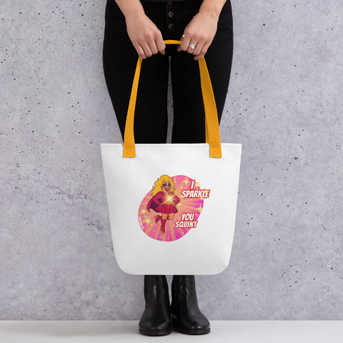 White tote bag with 'I Sparkle, You Squint Drag Queen Supreme Tote Bag' design — Totes first.
