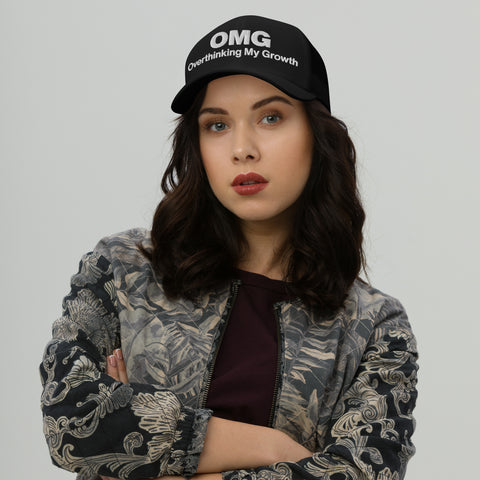 Black retro trucker hat with 'OMG Retro Hat (White Thread)' design — Funny mental health merch that doubles as a Thinking Cap—mesh in the back, spiral in the front.