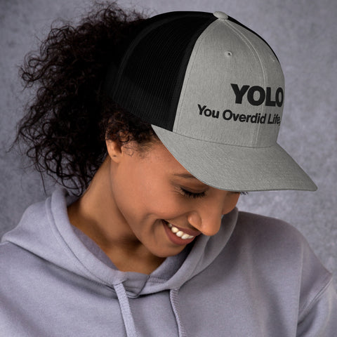 Black retro trucker hat with 'YOLO Retro Hat (Black Thread)' design — Emotional support fashion with shade and ventilation.