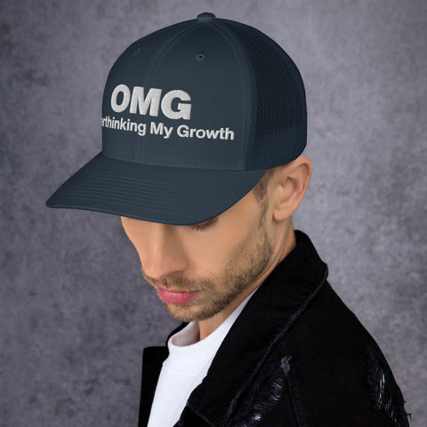 Navy retro trucker hat with 'OMG Retro Hat (White Thread)' design — Funny mental health merch that doubles as a Thinking Cap—mesh in the back, spiral in the front.