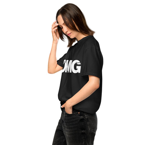 Black unisex garment-dyed heavyweight t-shirt with 'OMG Unisex Tee Black' design — Emotional support clothing for when your healing loops into a flashback—this tee gets your spiral.